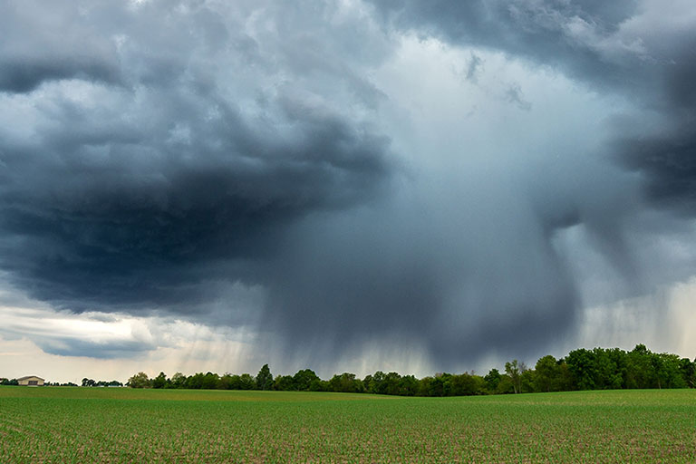 dramatic sky showing a microburst thunderstorm